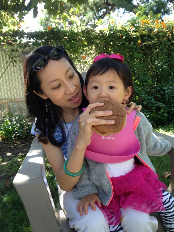 Roxy's 1st taste of a burger