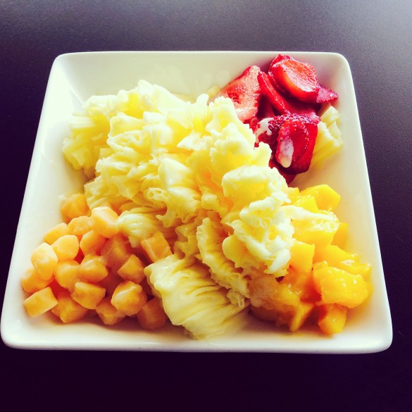 Mango shaved snow with mango, strawberries, mango mochi, and a condensed cream cap