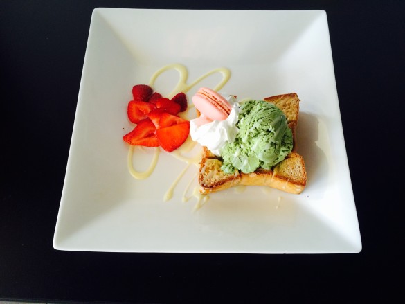 Brick Toast with strawberries, green tea ice cream, and a strawberry macaron