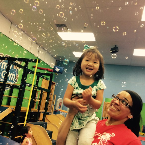 Roxy at MyGym playing with bubbles
