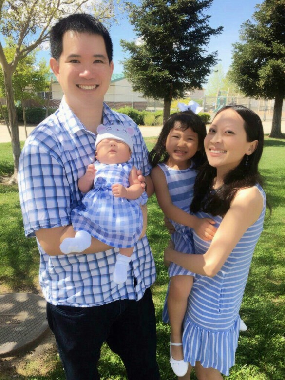 Kenny holding Carissa  and me holding Roxy on Easter Sunday